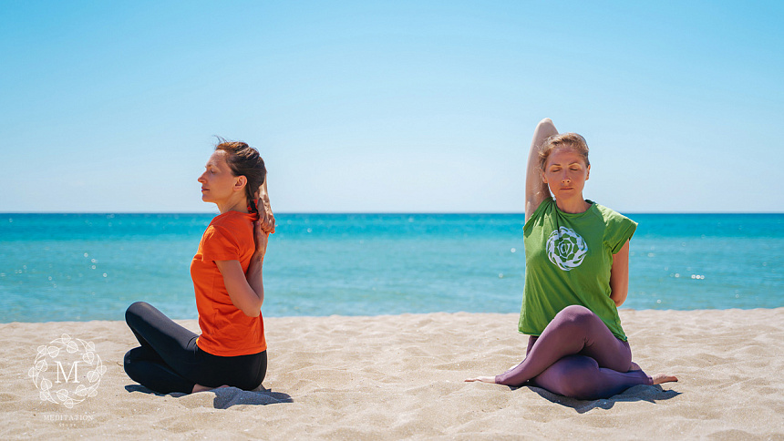 gomukhasana, yoga on the beach