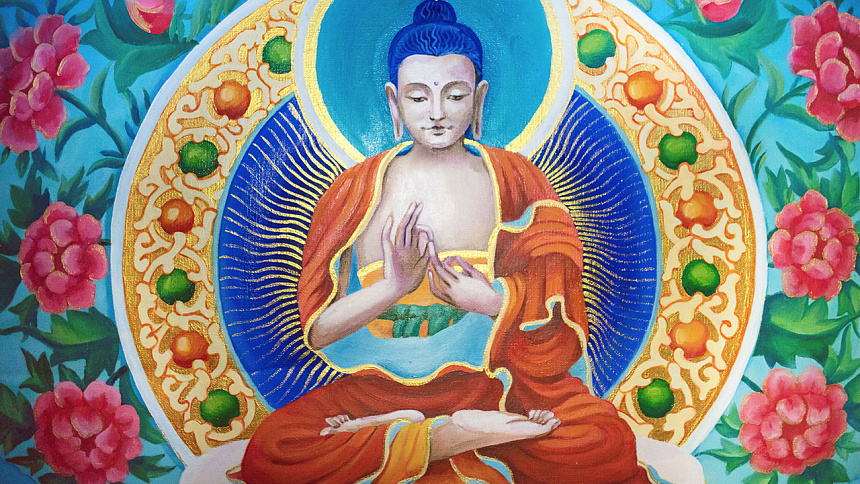 Image of Buddha in lotus position foto