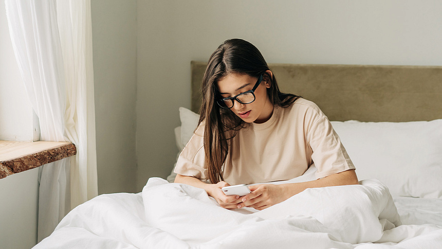 Girl sitting on her phone
