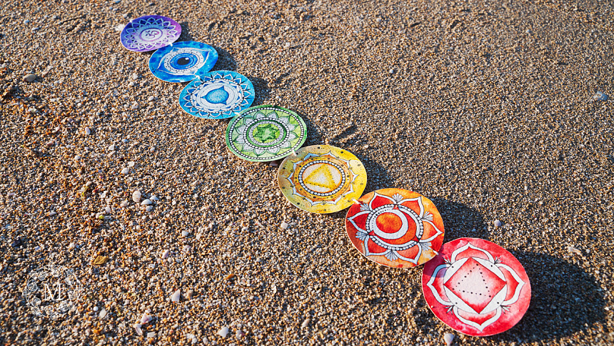 chakras, rosaries, sand. Seven chakras.