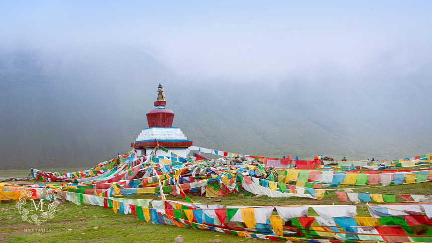 the stupa, the flags, the mountains